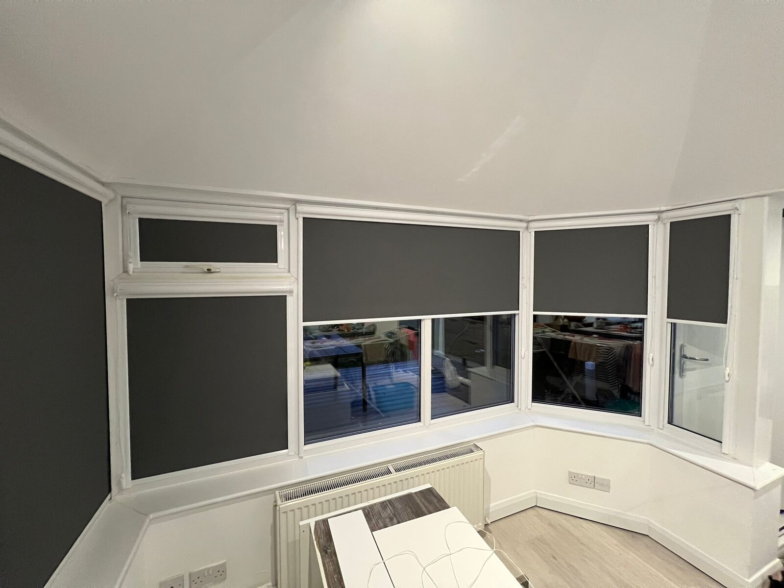 Roller blinds installed in Perfect Fit window frames